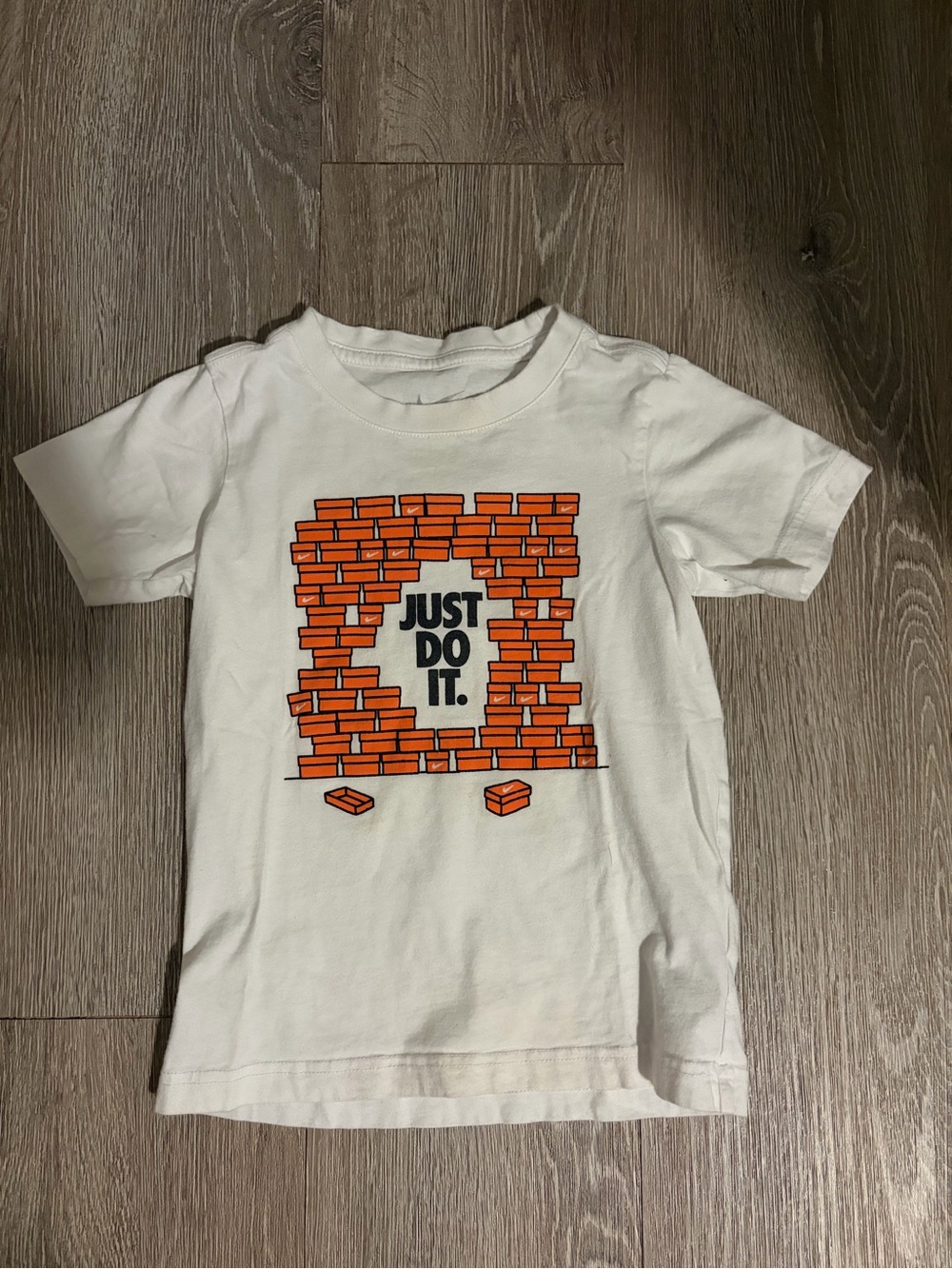 Nike White Tee with Orange Brick 'Just Do It.' Graphic